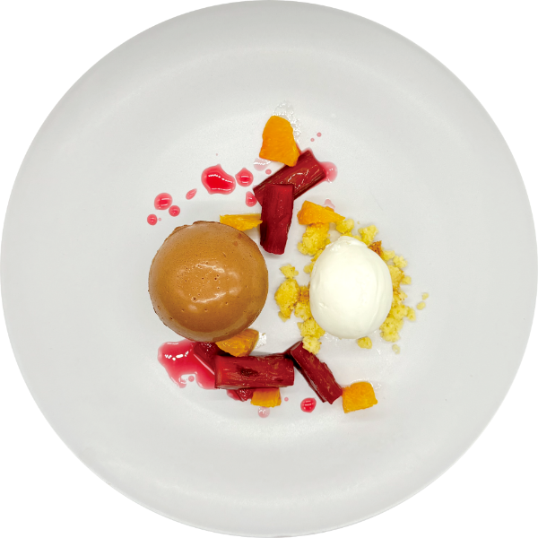 <p>Chocolate Mousse - Rhubarb - Oranges -Vanilla Ice Cream</p>
