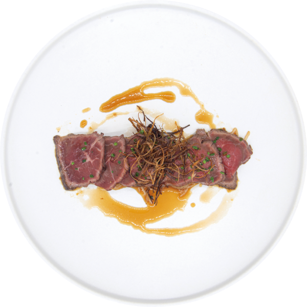 <p>Lightly Seared Beef Served Thinly Sliced and Finished with a Bright, Umami-Rich Tosazu Dressing and Fragrant Leek Oil<br />
 </p>
