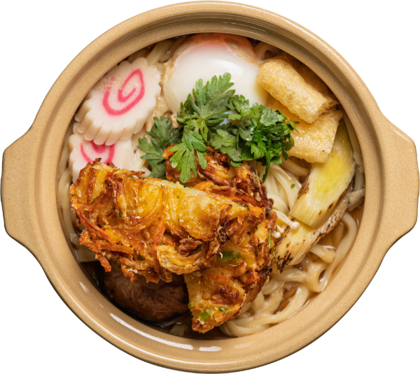 <p>Traditional Japanese Hot Pot Udon Served in a Rich Dashi Broth with Egg, Vegetables, and Kakiage</p>
