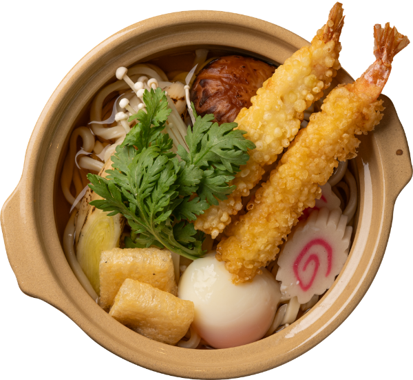 <p>Traditional Japanese Hot Pot Udon Served in a Rich Dashi Broth with Egg, Vegetables, and Tempura Prawn</p>
